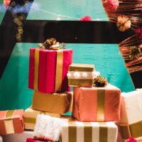 pile of gift boxes beside wall